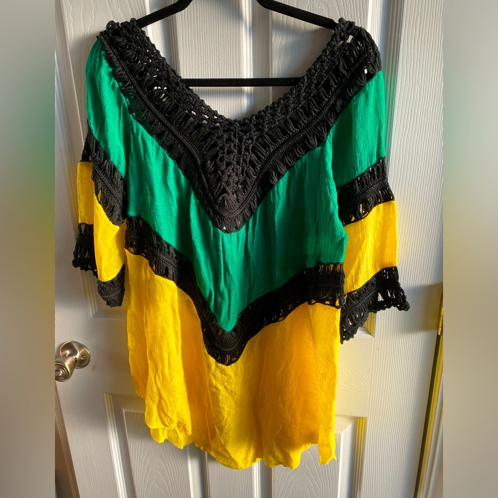 Blue moon brand 100% cotton Jamaican color women top. New with tag. Beautiful!!